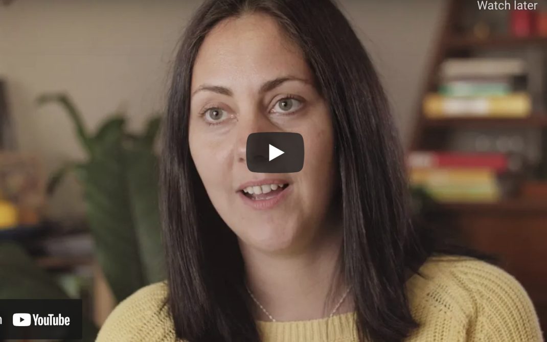 Woman in a YouTube video frame