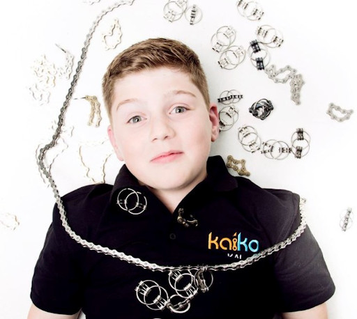 Kid laying with fidget toys